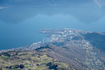 aerial landscape of Castro lakeside village  from north,  Orobie, Italy