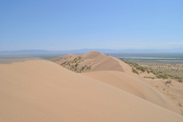 Singing dune in Kazakhstan. The musical sand of the Altyn-Emel National Park. Desert. Dune.