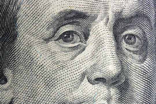 Benjamin Franklin portrait from hundred dollar bill, macro