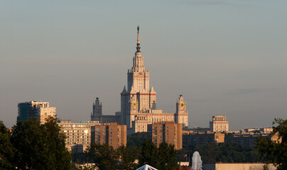 Fototapeta na wymiar Main Building of Moscow State Univercity in sunset. Residental building on foreground. 