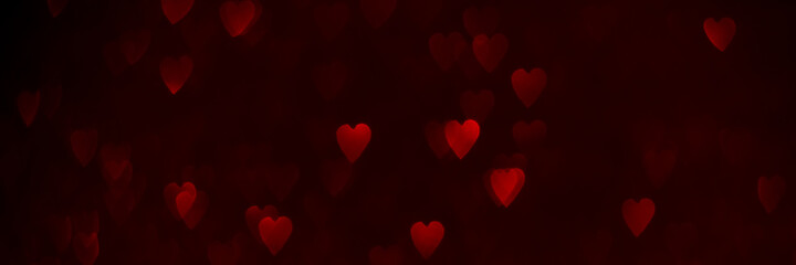 Red hearts, sparkling glitter bokeh background texture. Holiday valentines day lights. Abstract...