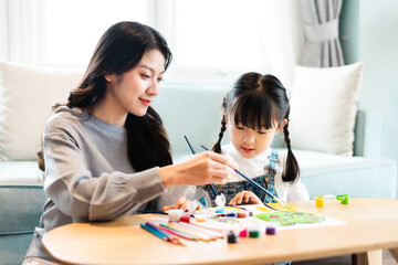 picture of mother and daughter drawing pictures