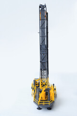 Large drill rig for drilling boreholes for explosives on a white background. Technologies of...