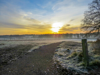 sunrise in the countryside on a bright frosty winter day	
