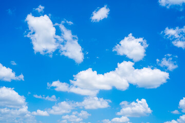 Naklejka na ściany i meble Blue sky with white clouds. on a clear day
