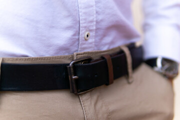 Unrecognizable young man with brown belt