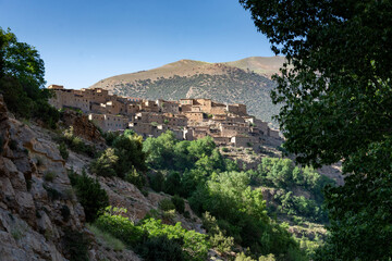 The Atlas Mountains in Morocco. A Berber village clings to the side of the mountain