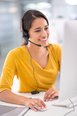 Every client is important to her. Shot of a young customer service representative wearing a headset...