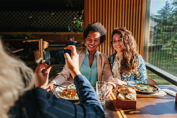 Meeting of girls at the modern restaurant