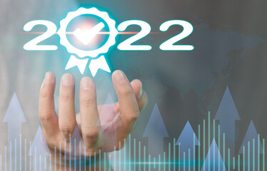 The new year 2022 concept, business goals strategy, and a virtual screen, new year business, corporate unity power, new ideas will happen in the future, with copy space.