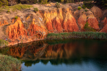Colorful bauxite quarry lake in Apulia, Italy