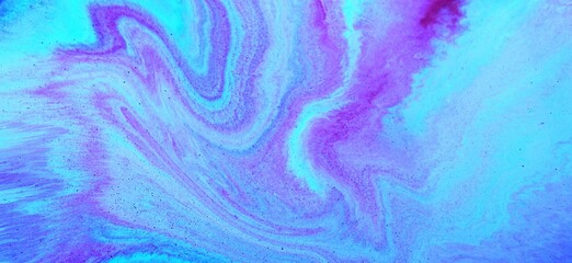 Abstract background of purple-blue marble. Acrylic texture with marble pattern. Mixing colors creates an interesting structure. It is well suited for laptop background and wallpaper, fabric