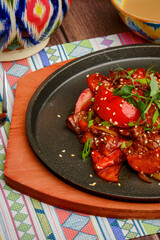 meat with vegetables on a plate