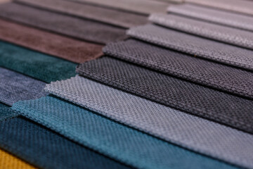 Samples of furniture fabrics.Multicolor fabric texture background.