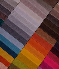 Samples of furniture fabrics.Multicolor fabric texture background.