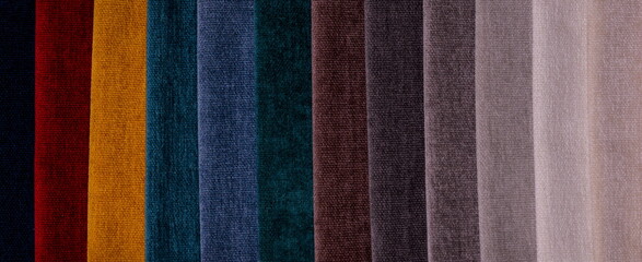 Samples of furniture fabrics.Multicolor fabric texture background. Chenille. Banner