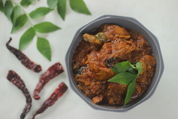 Chicken gravy. Semi dry Chicken gravy prepared in Kerala style with onions tomatoes and spices