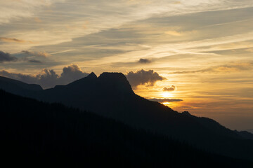 Giewont peak against the setting sun. Western Tatra Mountains.