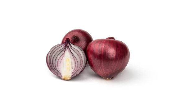 Red onion bulbs on white background