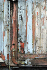 Iron Lock on Decaying Timber Door of Old Railway Wagon 