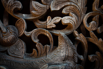 Ornaments of ancient vikings on a wooden surface. External wooden wall carved decoration of...
