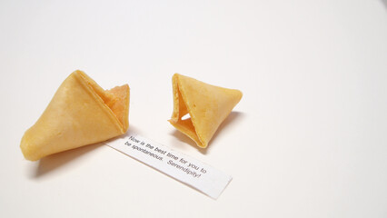 Close up to the fortune cookie and the message