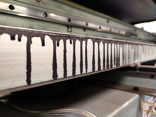 Paint smudges on an industrial wide-format plotter (printer) ..