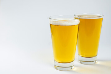 two glasses of fresh cold beer. st patrick's day concept