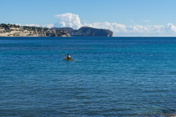 kayak paddler on the blue mediterranean sea beautiful water sports