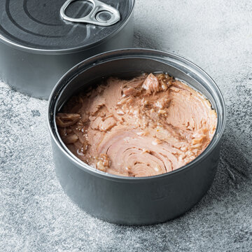Canned Albacore Wild Tuna, in tin can, on gray background, square format
