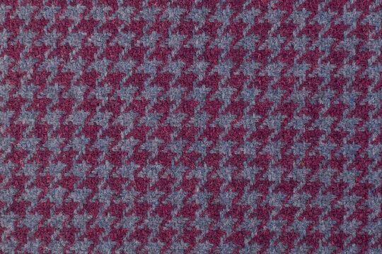 Classic tweed, Wool Background Texture. Coat close-up. Expensive men's suit fabric. Glenurquhart check is made of woolen fabric with a woven twill design of small and large checks. Houndstooth seamles