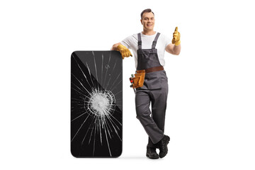 Repairman with a broken smartphone