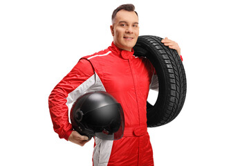 Racer in a red suit holding a tire and a helmet