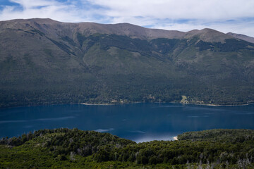 View of Gutierrez lake, the forest and mountains, from Catedral hill in Bariloche, Patagonia Argentina. 