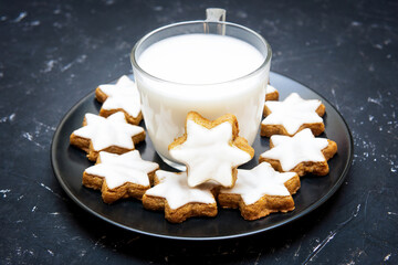 Leaving cinnamon cookies and milk for Santa