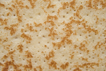 Pancake texture background. Pancake surface pattern macro view. Traditional russian sweet dessert.