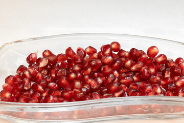 Closeup of Pomegranate seeds in a glass bowl