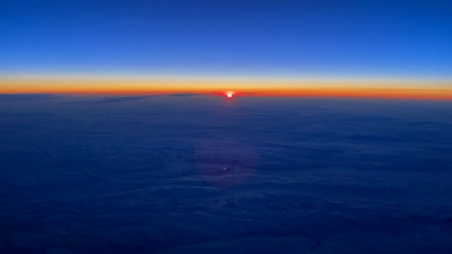 This is an aerial time lapse of a flight over northern Greenland sharing the sun westbound.