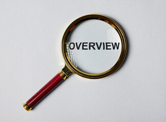 Overview word through magnifying lens. Recap and summary concept.