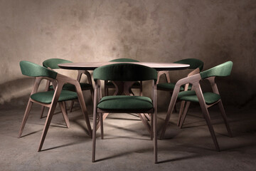 Beautiful brown wooden folding table on beige concrete background