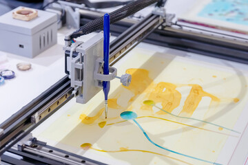 Electronic robot equipped with a brush, thanks to a particular algorithm is able to paint figures on paper by coloring them with watercolors. With this technology, the robot creates colors pictures.