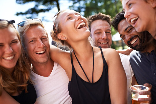 Laughter brings them closer. Cropped shot of friends at the Skanderborg festival.