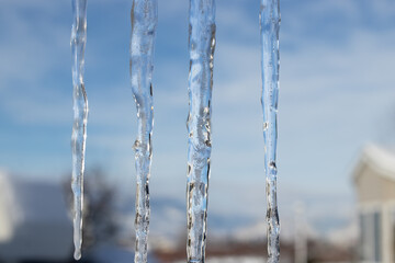 icicles hanging from a roof