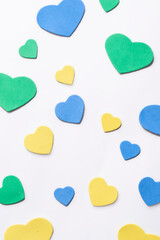 Valentine's Day. Isolated multi-colored hearts on a white background, top view, copy space