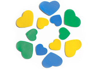 Valentine's Day. Isolated multi-colored hearts on a white background, top view, copy space
