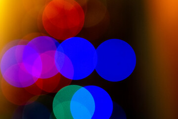 bokeh in the form of colorful circles out of focus. abstract composition of lights and colors