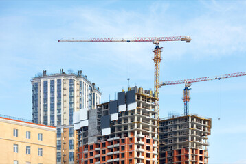 Construction of high rise residential complexes according to the modern method of monolithic frame technology.