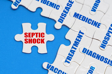 On the blue surface, puzzles with medical inscriptions, on a separate puzzle it is written - Septic shock