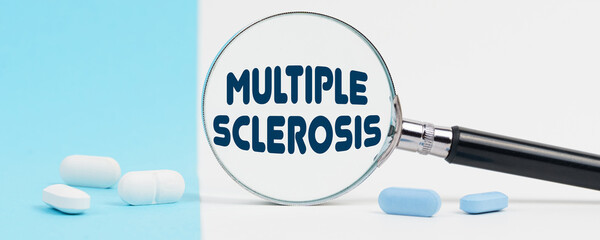 On a blue and white background, there are pills and a magnifying glass, inside of which it is...