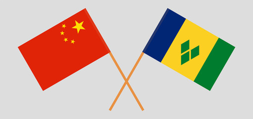 Crossed flags of China and Saint Vincent and the Grenadines. Official colors. Correct proportion